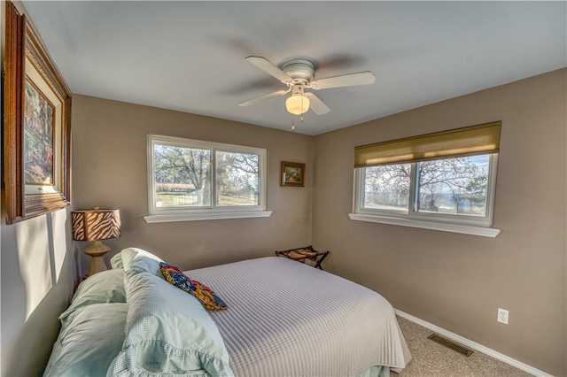 bedroom featuring ceiling fan and carpet flooring