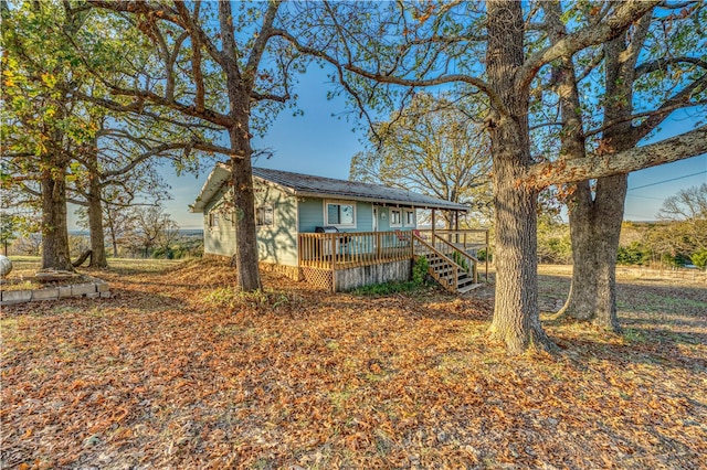 exterior space featuring a deck