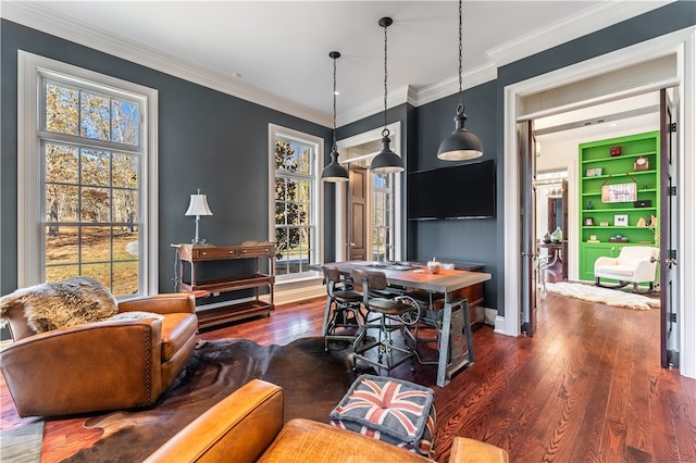 dining room featuring ornamental molding and dark hardwood / wood-style floors