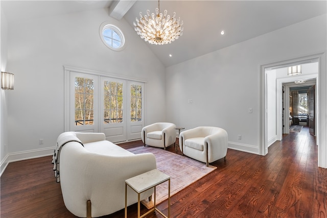 living room with dark wood-type flooring, beamed ceiling, and a healthy amount of sunlight