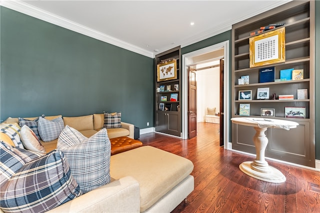 living room featuring dark hardwood / wood-style flooring and crown molding