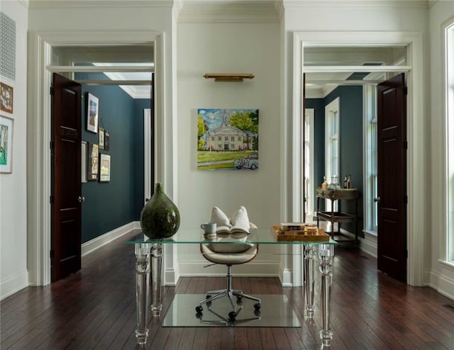 hallway with ornamental molding and dark hardwood / wood-style floors