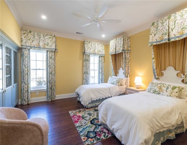 bedroom with ceiling fan, dark hardwood / wood-style flooring, and ornamental molding