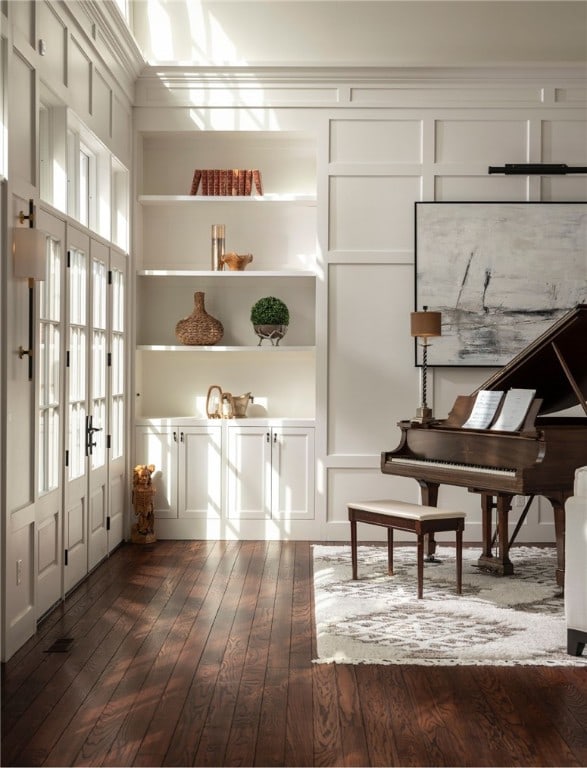 miscellaneous room featuring french doors and dark hardwood / wood-style flooring