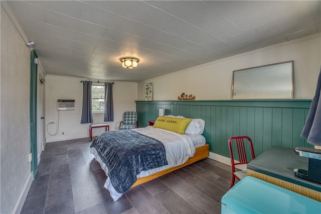 bedroom featuring ornamental molding and a wall mounted AC