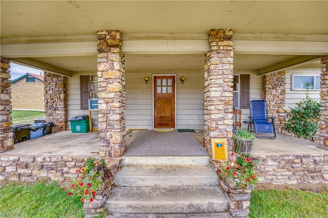 entrance to property with covered porch