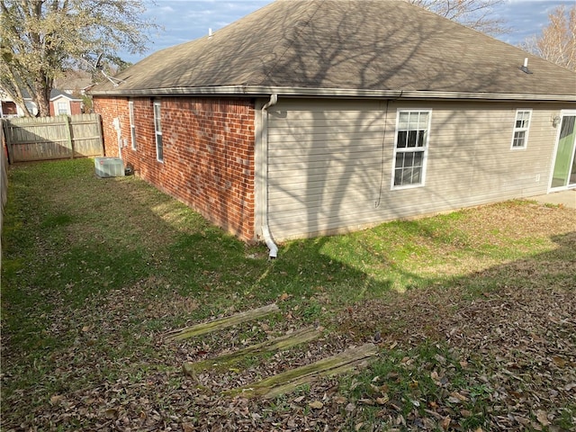 view of home's exterior featuring a yard