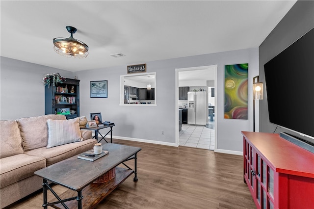 living room with wood-type flooring