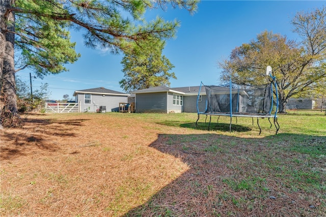 view of yard featuring a trampoline