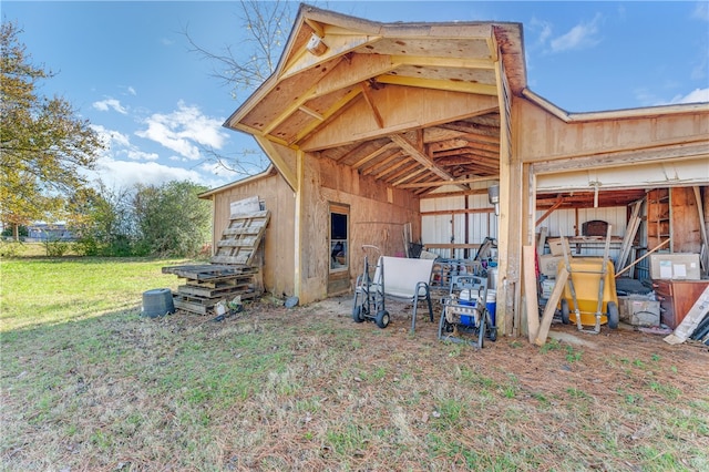 view of property exterior featuring an outdoor structure