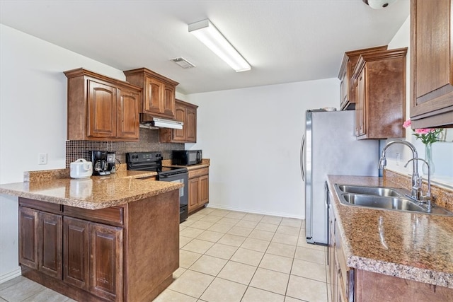 kitchen featuring decorative backsplash, kitchen peninsula, black appliances, sink, and light tile patterned floors