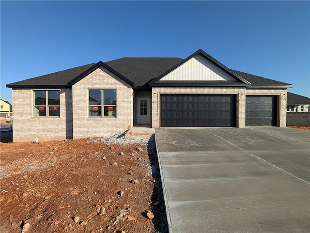 single story home featuring a garage