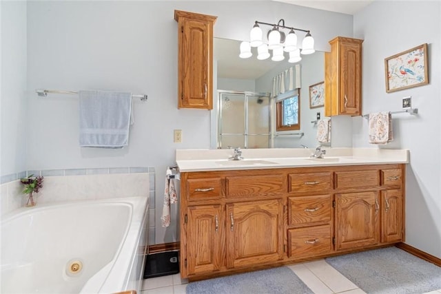 bathroom with shower with separate bathtub, tile patterned floors, and vanity