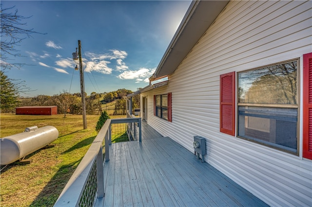 wooden deck with a yard