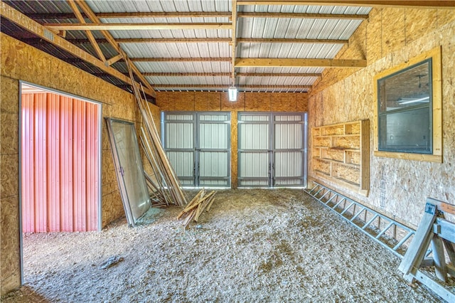 miscellaneous room featuring beamed ceiling, high vaulted ceiling, and carpet floors