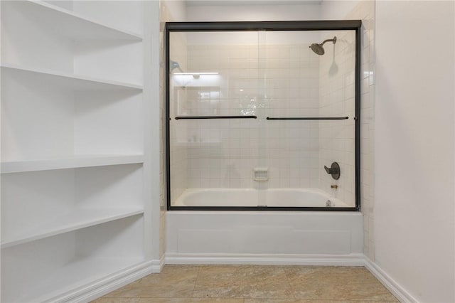 full bath with combined bath / shower with glass door