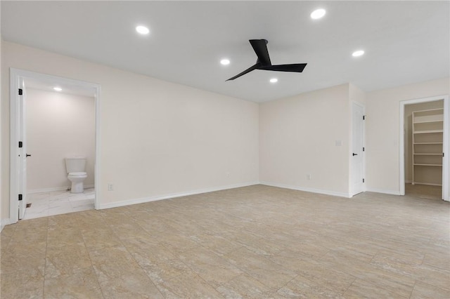 spare room featuring ceiling fan