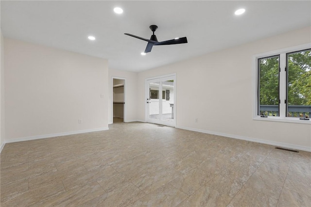 spare room featuring ceiling fan