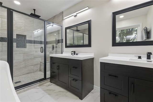 bathroom with a stall shower, marble finish floor, recessed lighting, and two vanities