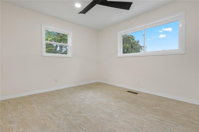unfurnished room featuring recessed lighting, visible vents, ceiling fan, and baseboards