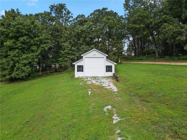 view of outdoor structure with a yard