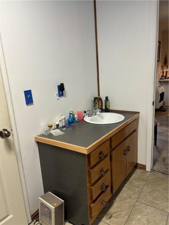 bathroom featuring vanity and tile patterned flooring