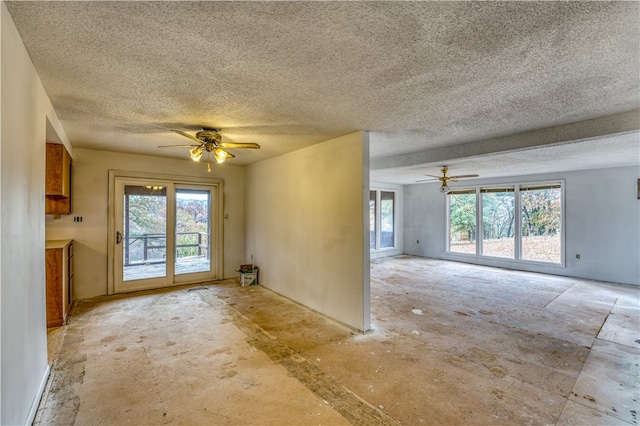 unfurnished room featuring ceiling fan