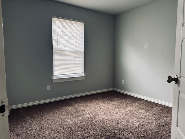 unfurnished room with carpet