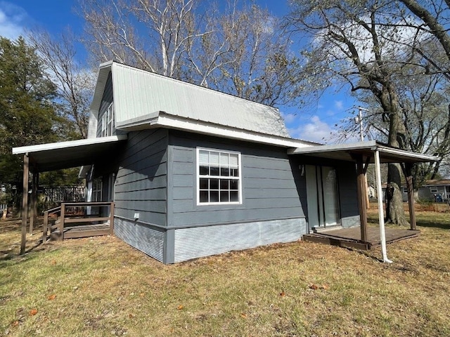 view of property exterior featuring a yard