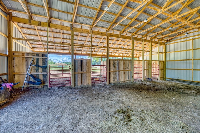 miscellaneous room with high vaulted ceiling