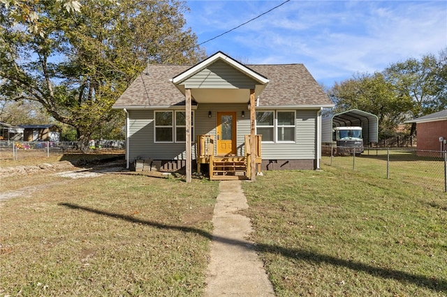 bungalow with a carport, roof with shingles, fence, and a front lawn