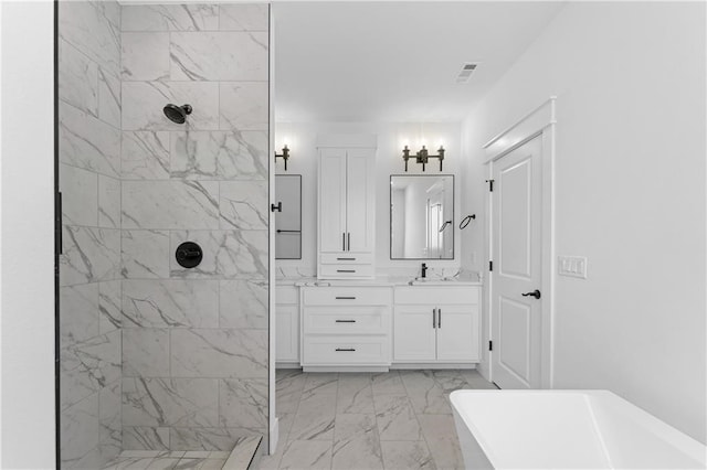 bathroom featuring separate shower and tub and vanity