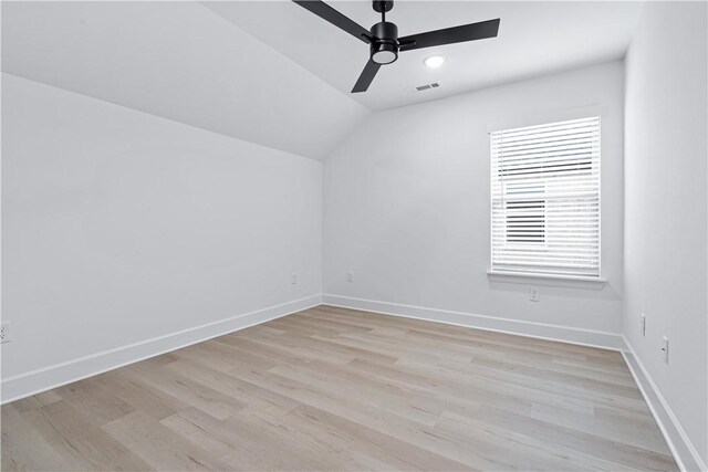 bonus room with lofted ceiling, light wood-type flooring, and ceiling fan