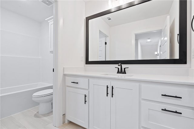 full bathroom featuring toilet, vanity, and shower / bathtub combination