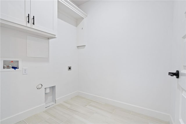 laundry room featuring washer hookup, cabinets, and hookup for an electric dryer