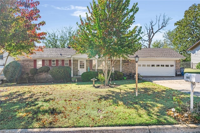 single story home featuring a front yard and a garage