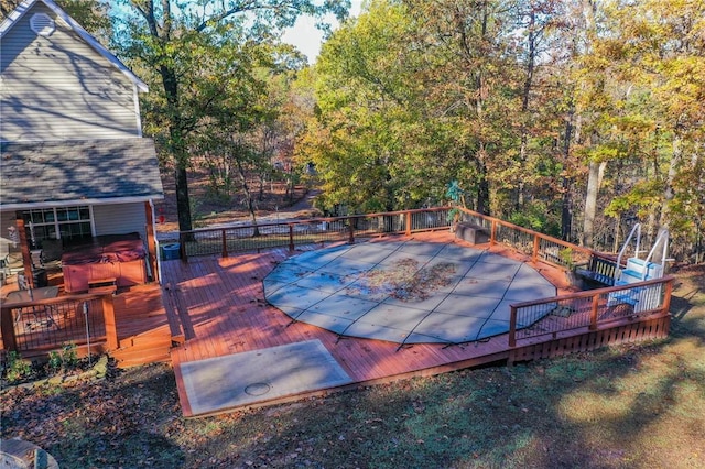 view of pool with a deck