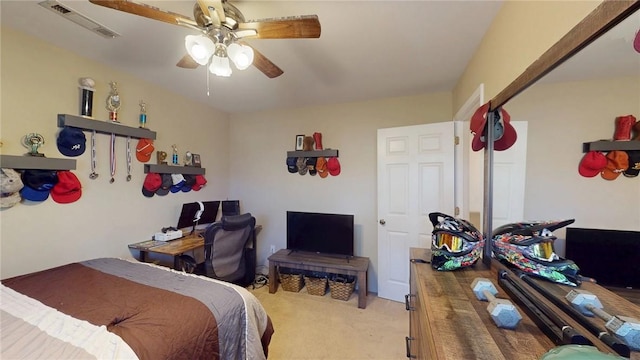 bedroom with ceiling fan, visible vents, and carpet flooring