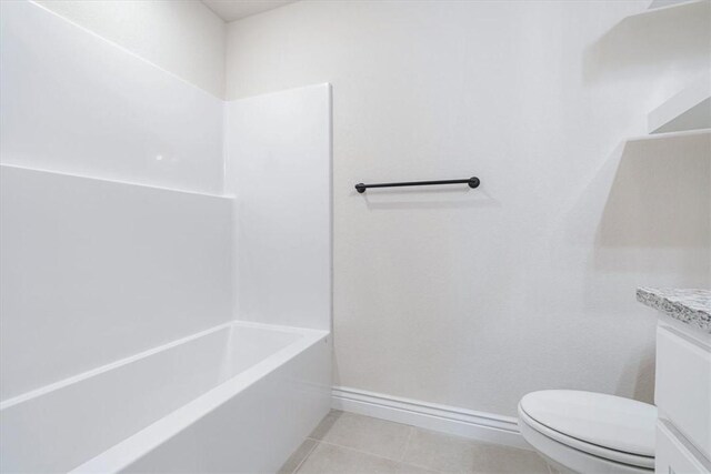 6602 SW Spindle St, Bentonville, AR 72713 - full bathroom with tile patterned floors, vanity, toilet, and baseboards
