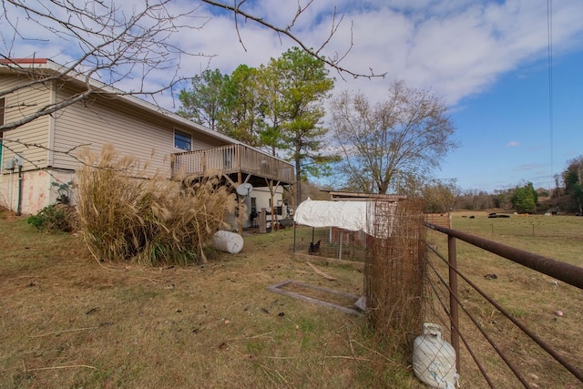 view of yard with a deck