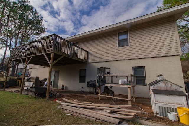 rear view of property with a deck