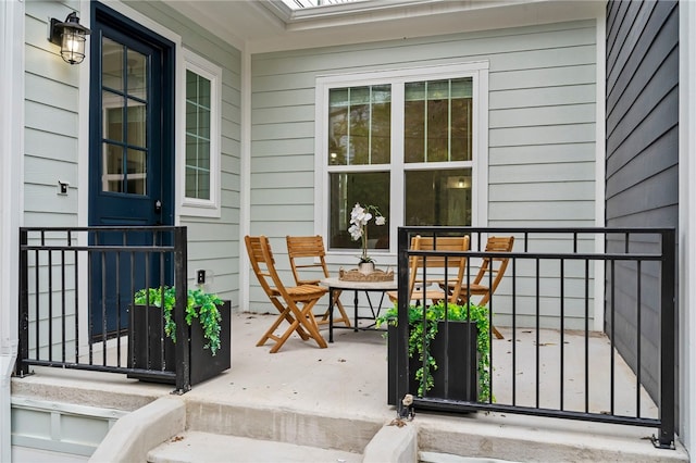 property entrance with covered porch