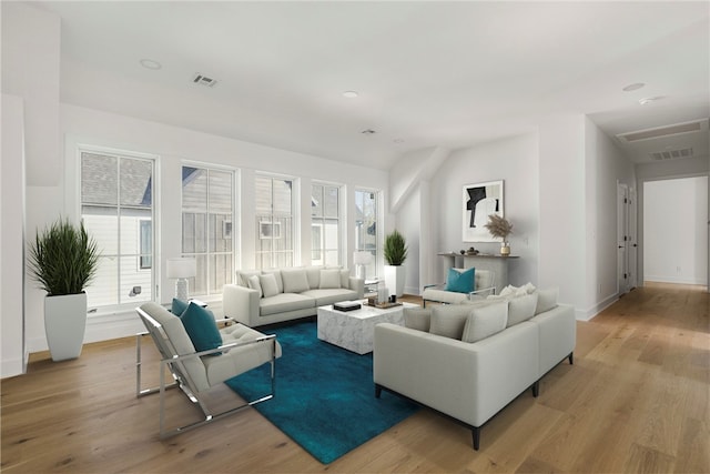 living room with light hardwood / wood-style flooring