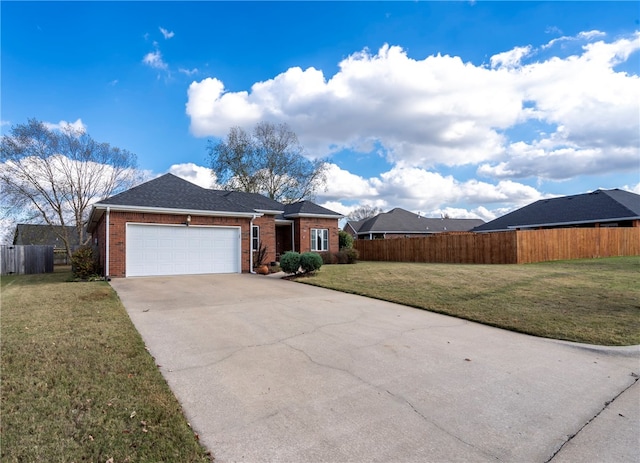 single story home with a garage and a front yard