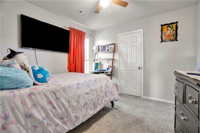 carpeted bedroom with ceiling fan