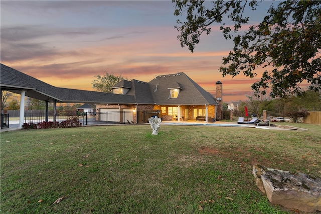 exterior space with a yard and a patio