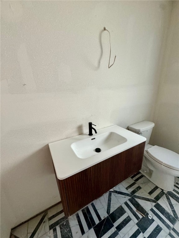 bathroom with sink and toilet