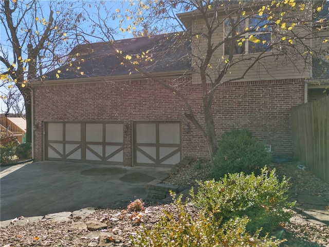 exterior space with a garage