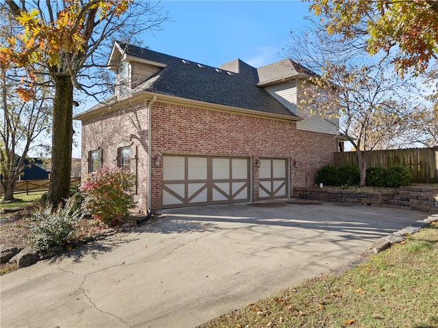 view of home's exterior featuring a garage