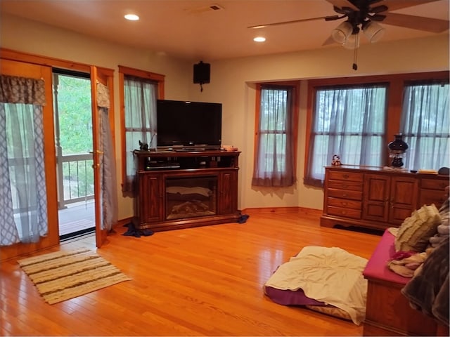 interior space featuring light hardwood / wood-style flooring and ceiling fan